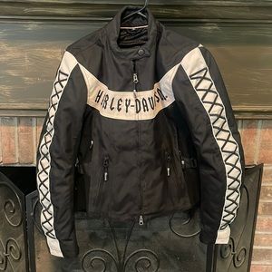 Basically brand new motorcycle jacket for women. Size medium and Harley Davidson